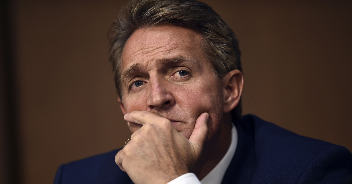 Sen. Jeff Flake (R-AZ) listens during Brett Kavanaugh's US Senate Judiciary Committee confirmation hearing to be an Associate Justice on the US Supreme Court, on Capitol Hill in Washington, D.C., Sept. 4, 2018.