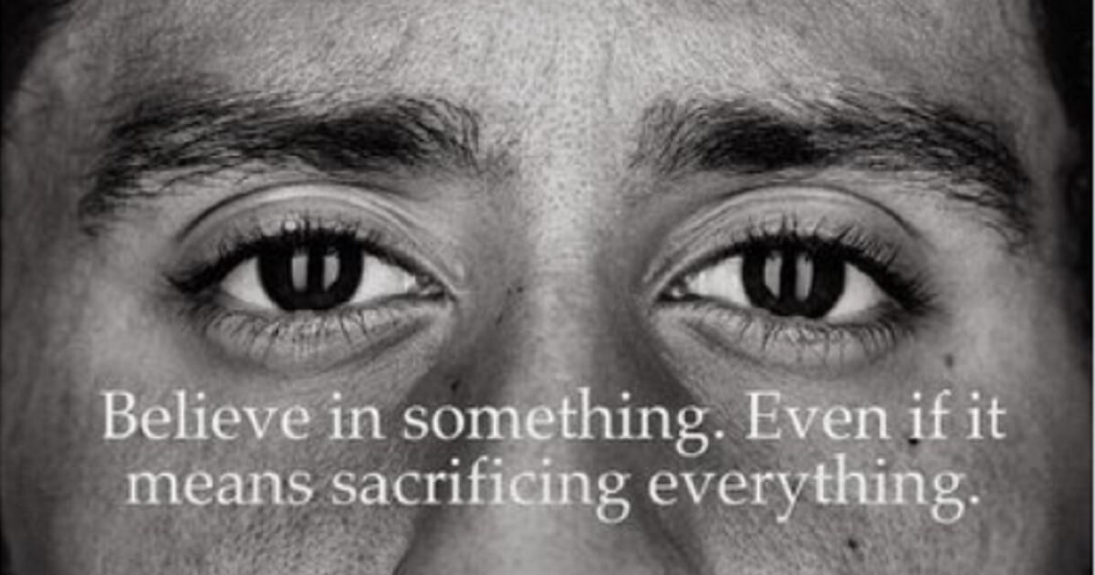 Colin Kaepernick's face superimposed with the slogan: "Believe in somethine. Even if it means sacrificing everything."