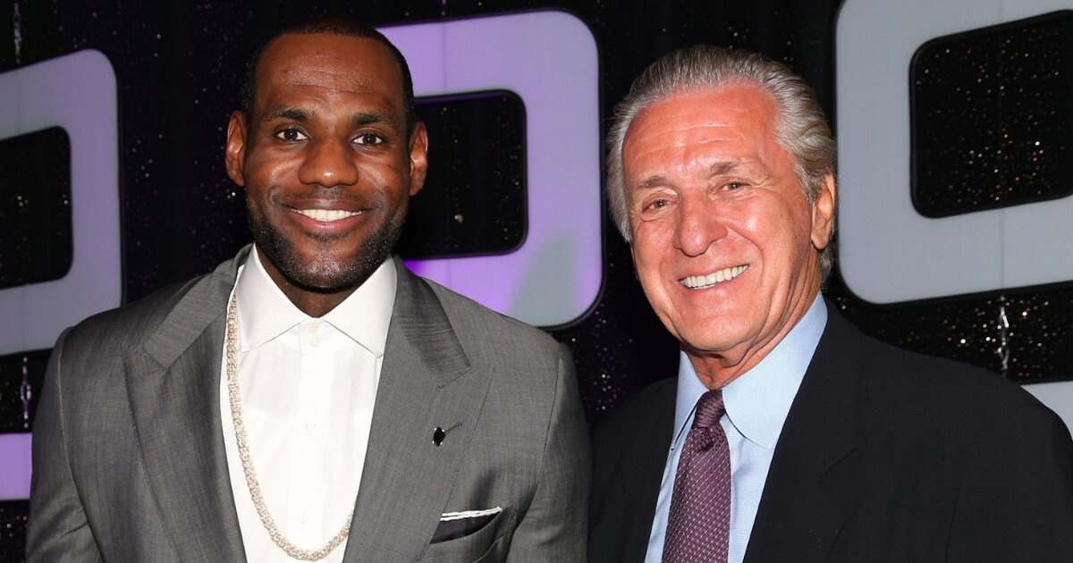 LeBron James, left, poses with Pat Riley during a 2014 awards banquet in Hollywood, Florida.