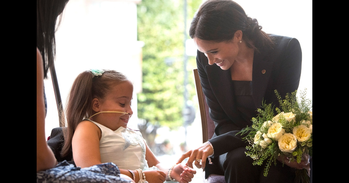 Meghan, Duchess of Sussex meets 7-year-old Matilda Booth during the annual WellChild awards at Royal Lancaster Hotel on September 4, 2018, in London, England.