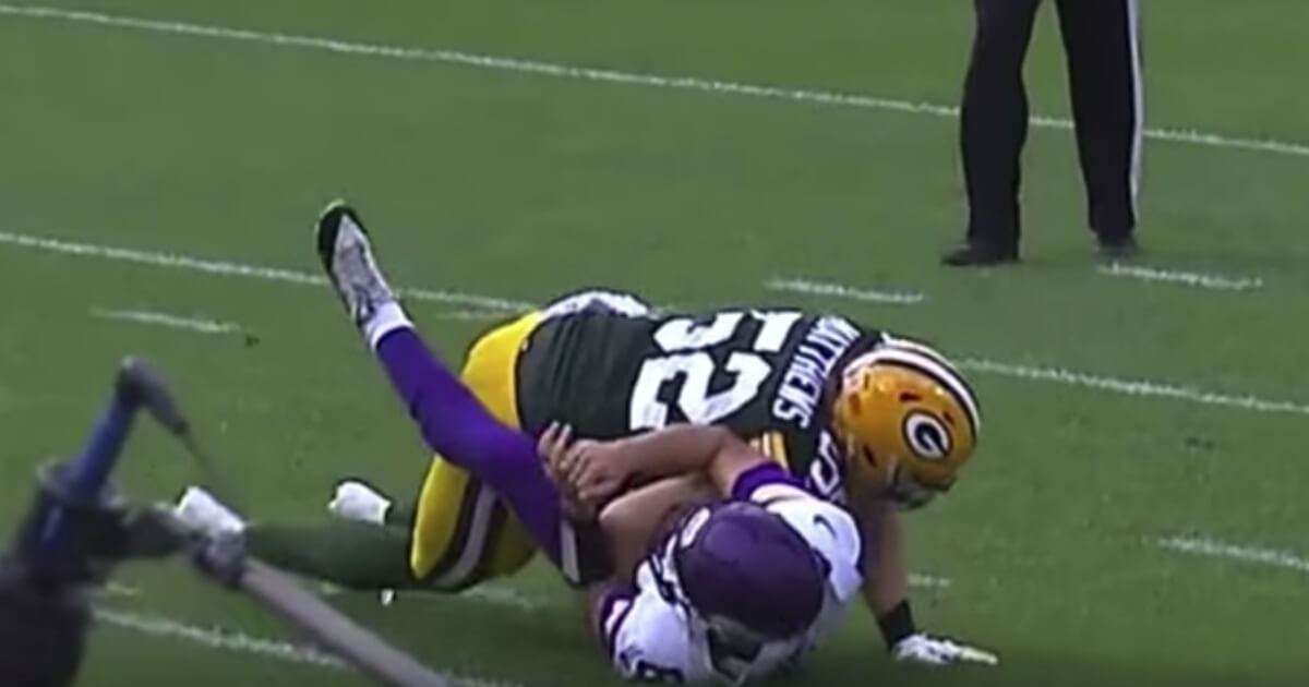 Green Bay's Clay Matthews was flagged for this hit on Vikings quarterback Kirk Cousins.