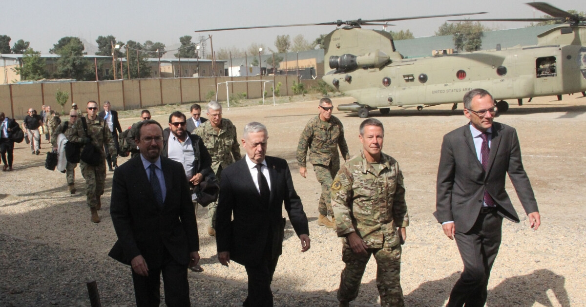 U.S. Defense Secretary Jim Mattis, second from left, arrives at NATO's Resolute Support mission in Kabul on Friday.
