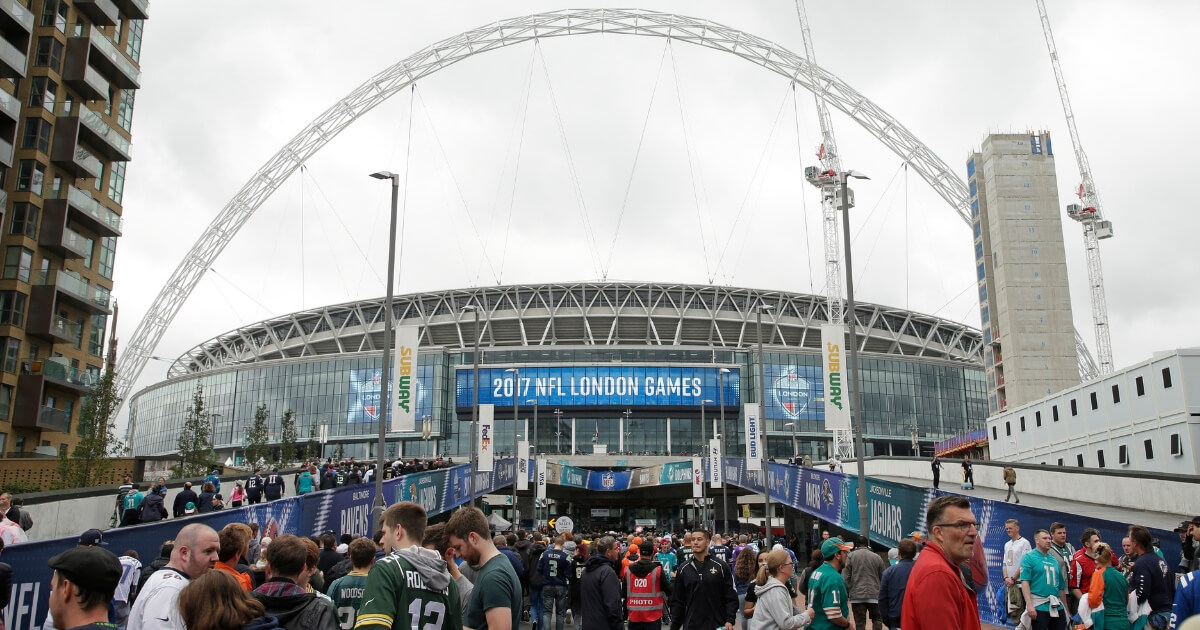 Fans arrive at Wembley Stadium in London prior to kickoff of the Oct. 1, 2017, game between the Miami Dolphins and the New Orleans Saints.