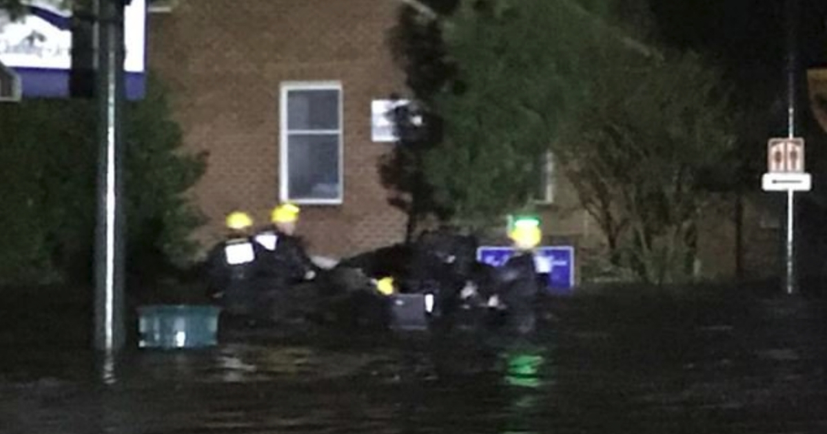 Police in New Bern, North Carolina, search for residents in need of assistance amid the flooding from Hurricane Florence.