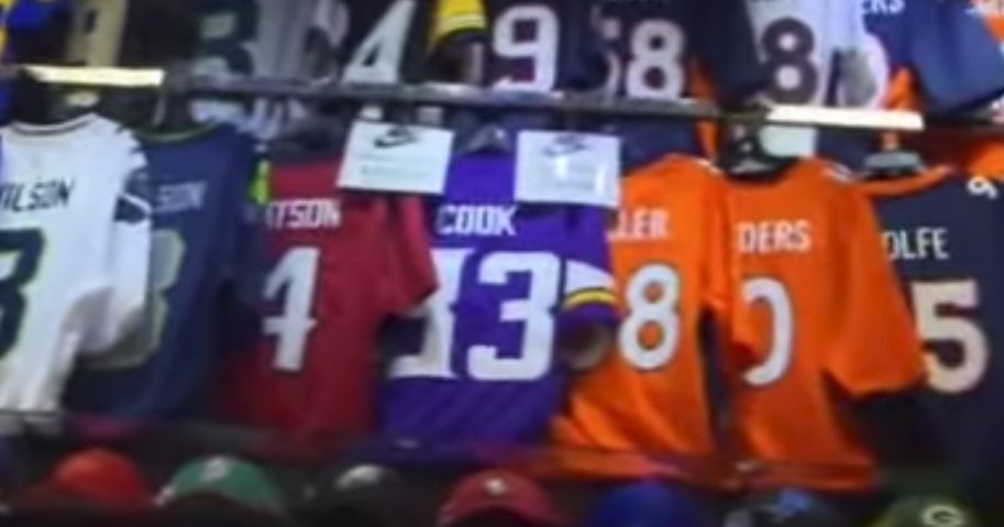 A wall of Nike jerseys in a store