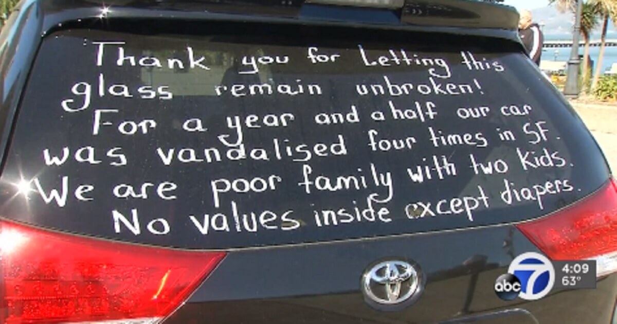 A note on a vehicle window from a San Francisco family begs thieves not to break in.