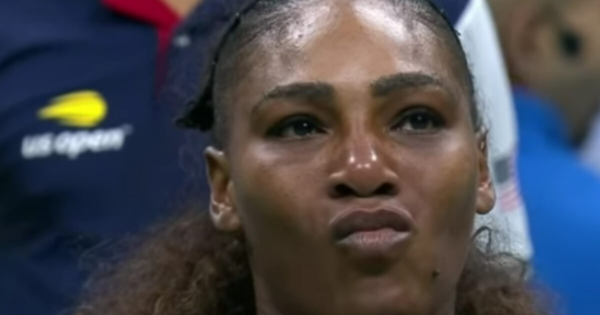 Serena Williams reacts after being penalized a point by the match umpire during the 2018 U.S. Open finals.
