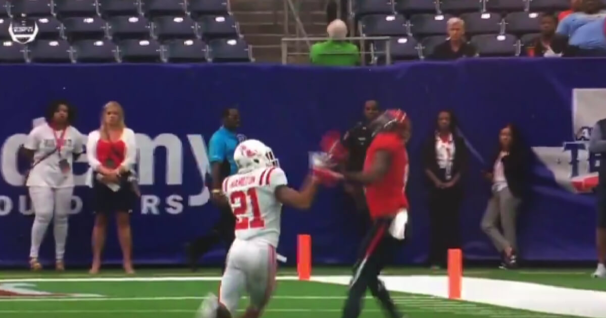 Texas Tech receiver T.J. Vasher leaps to make an incredible one-handed catch Saturday against Ole Miss
