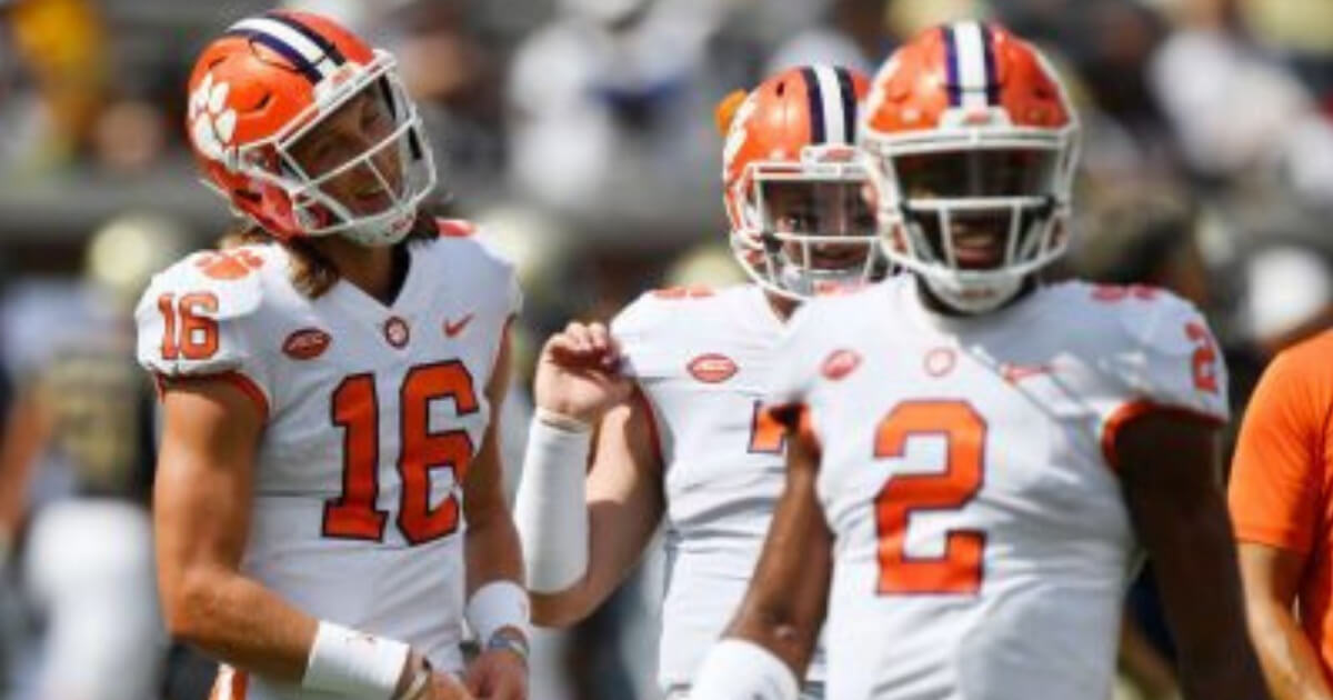 Clemson quarterbacks Trevor Lawrence (16) and Kelly Bryant (2) are pictured during warmups before Saturday's game at Georgia Tech.