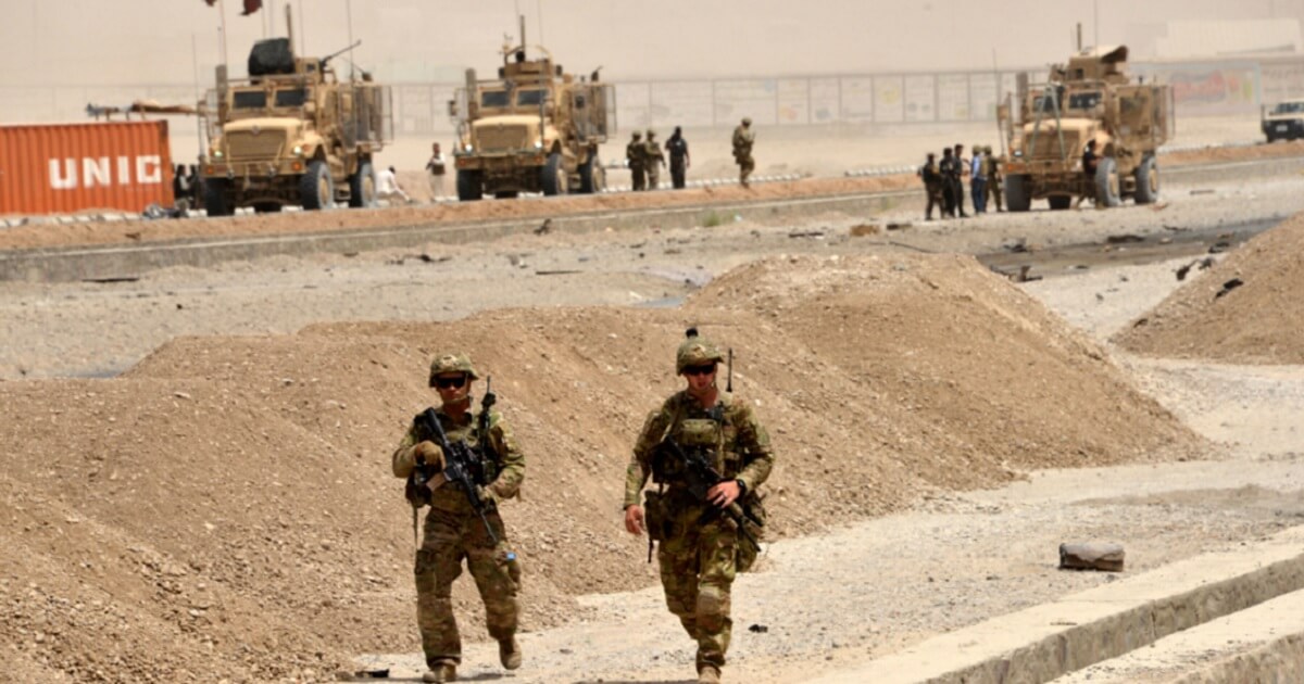 U.S. soldiers pictured from a distance in Afghanistan.