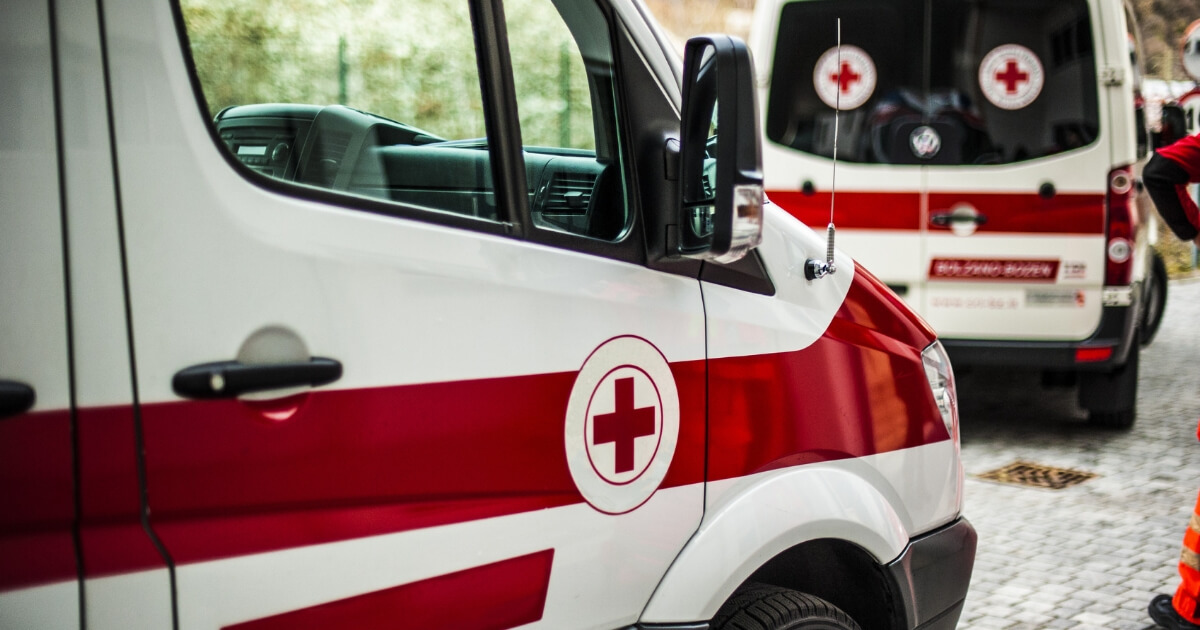 Red and white ambulances.