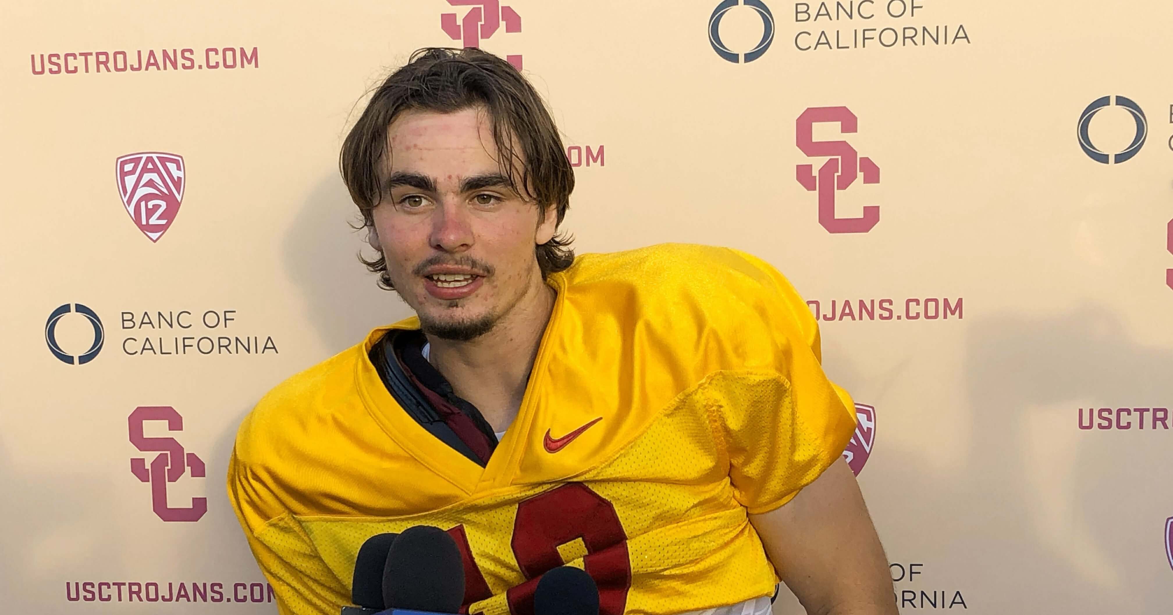 USC quarterback J.T. Daniels speaks to reporters Aug. 28 following his first practice after winning the Trojans' starting job in Los Angeles. There is little question about the talent in Daniels, USC’s first true freshman starting quarterback in a decade.