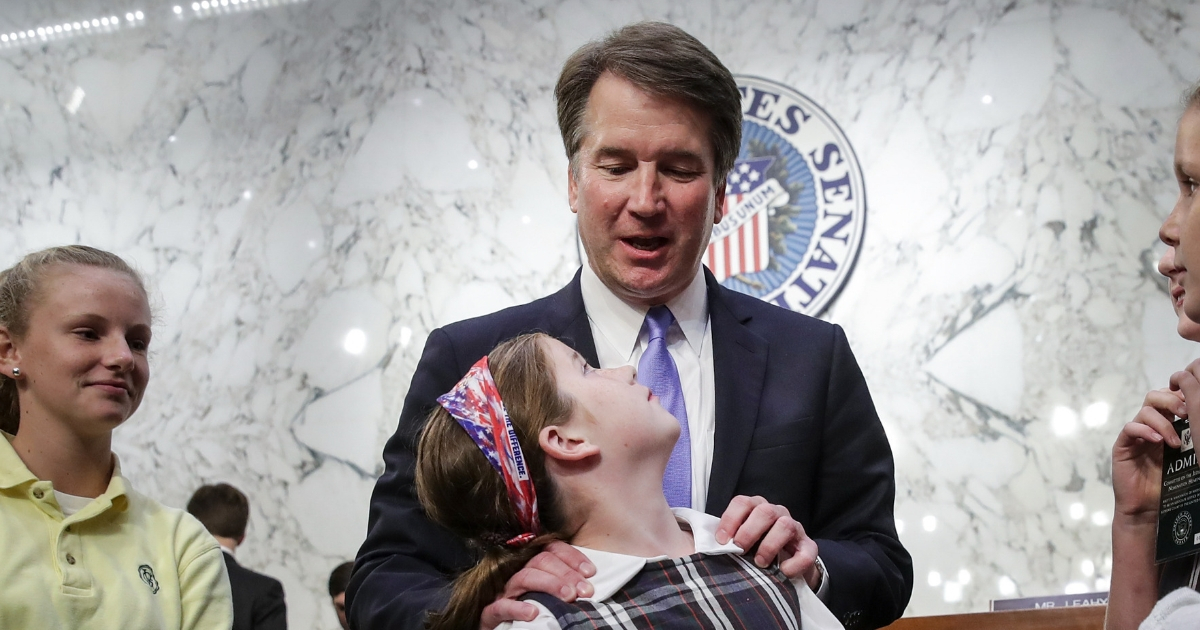 Supreme Court nominee Judge Brett Kavanaugh embraces his daughter Liza