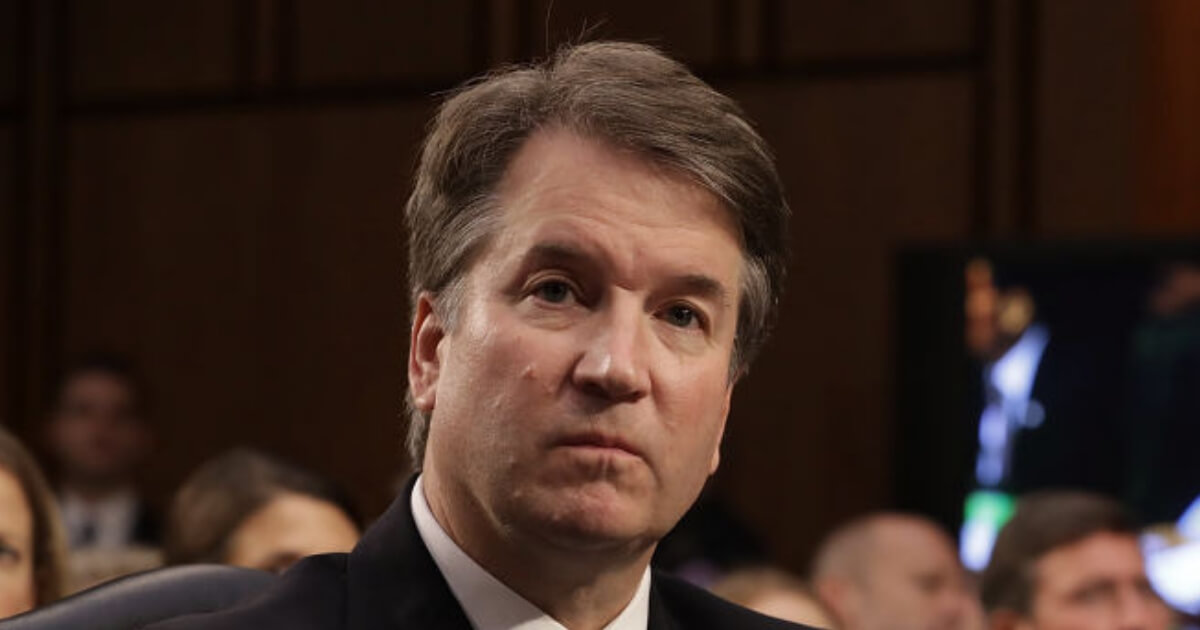 Supreme Court nominee Brett Kavanaugh listens to a question during his confirmation hearing.