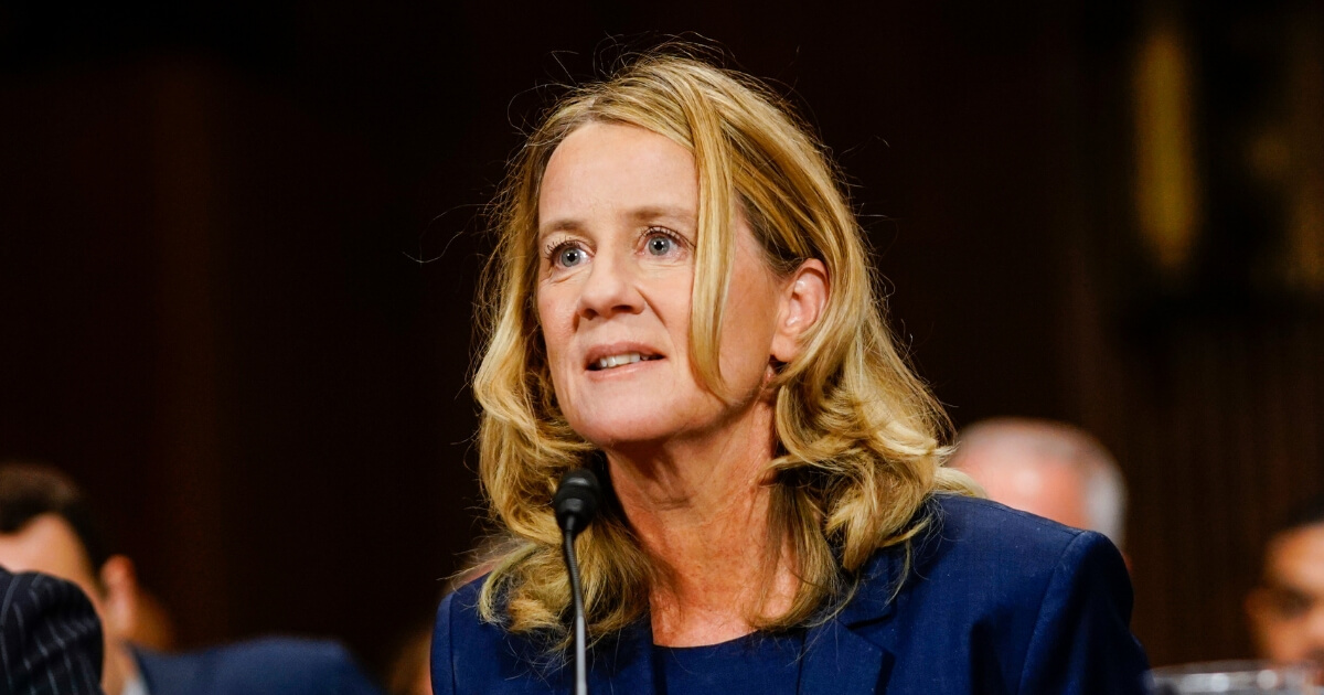 Christine Blasey Ford answers questions at a Senate Judiciary Committee hearing.