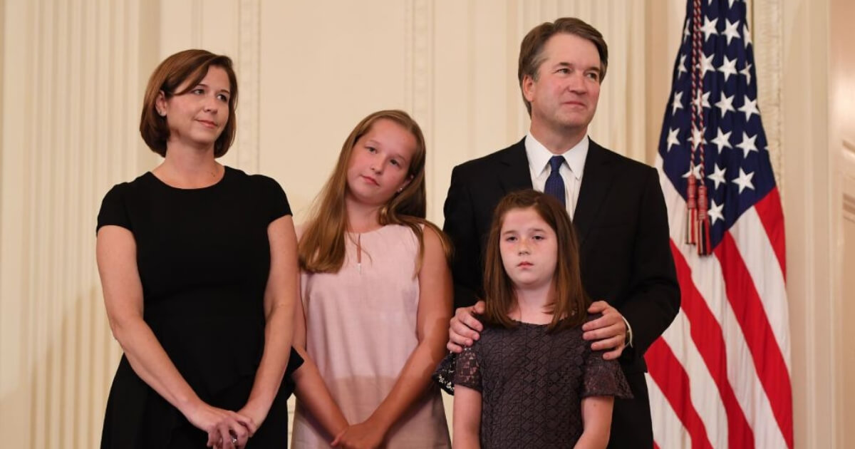 US Judge Brett Kavanaugh stands with his wife and two daughters as President Donald Trump announces him as his nominee to the Supreme Court in July.