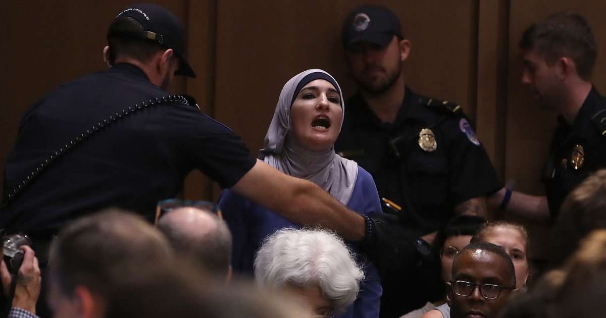 Protesters disrupt the start of the Supreme Court nominee Judge Brett Kavanaugh's confirmation hearing