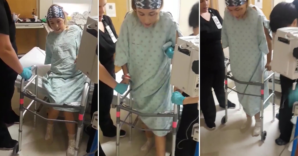Woman takes first steps after being in a car accident.