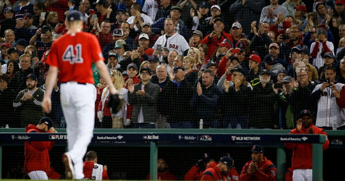 Fans cheers as Boston Red Sox starting pitcher Chris Sale leaves the game against the New York Yankees during the sixth inning of Game 1 of the American League Division Series on Friday in Boston.