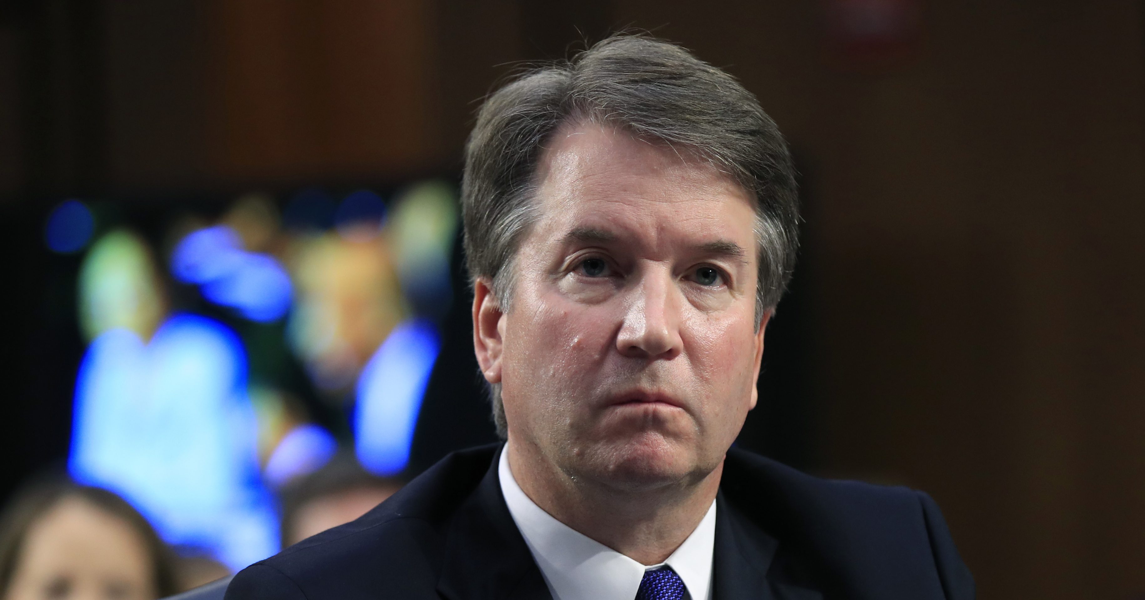 Supreme Court nominee Brett Kavanaugh, listens to Sen. Cory Booker speak during a Senate Judiciary Committee nominations hearing on Capitol Hill in Washington.