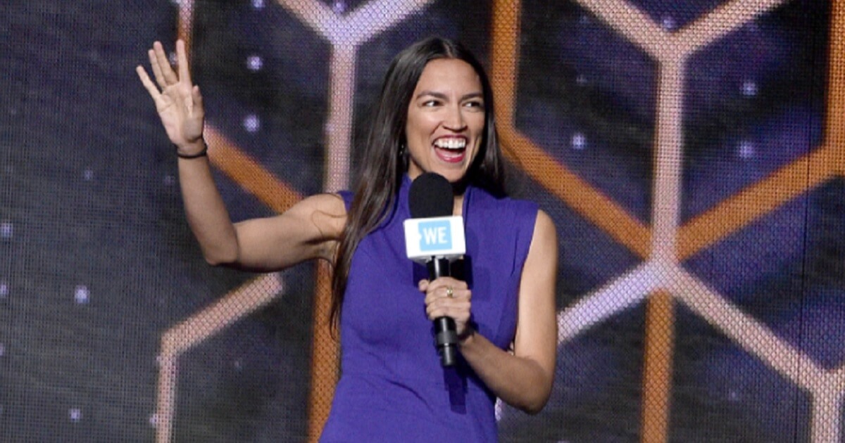 Democratic congressional candidate Alexandria Ocasio-Cortez takes the stage in September at the Barclay's Center in New York.