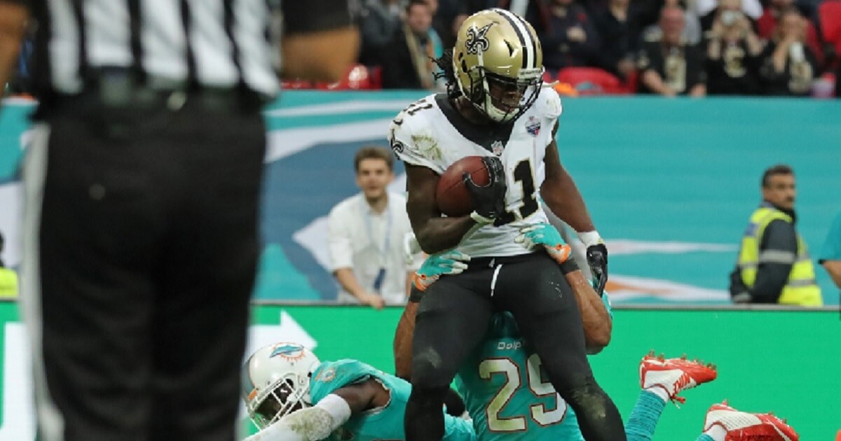 New Orleans Saints running back Alvin Kamara scores a touchdown during his 2017 rookie year against the Miami Dolphins during a game at Wembley Stadium in London.