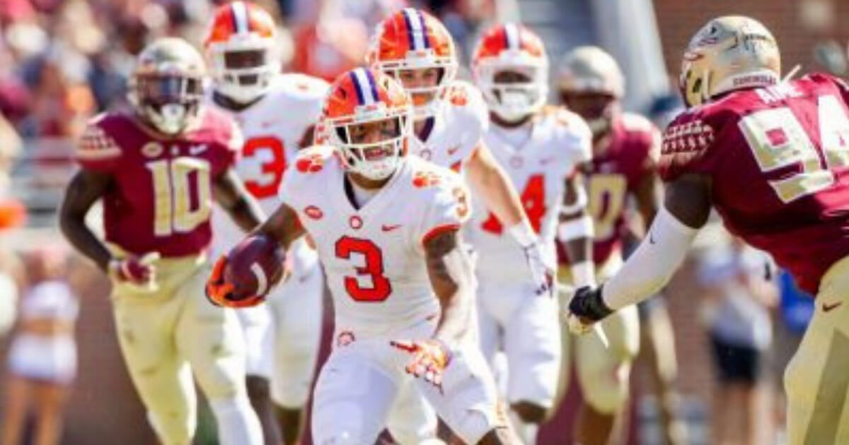 Clemson wide receiver Amari Rodgers tries to avoid a Florida State defender in Clemson's victory Saturday.