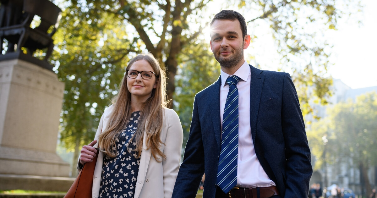 Bakery owners Amy and Daniel McArthur, who own 'Ashers' in Belfast, walk away from the Supreme Court after winning their appeal against a gay rights campaigner who took the business to court after they refused to make a cake, promoting same-sex marriage, on Oct. 10, 2018, in London, England.