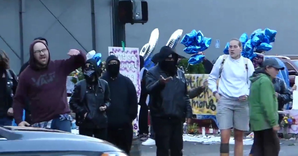 Antifa protestors block the street in Portland, Oregon.