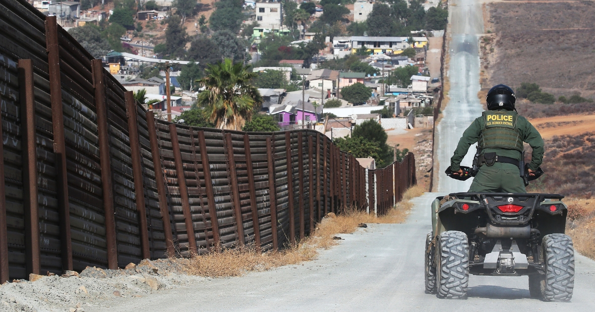 A U.S. Border Patrol agent patrols along a section of the U.S.-Mexico border