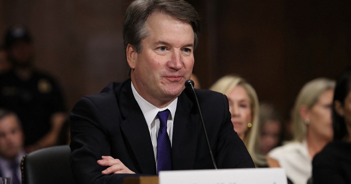 Supreme Court nominee Brett Kavanaugh is pictured at the table during his hearing before the Senate Judiciary Committee on Sept. 27.