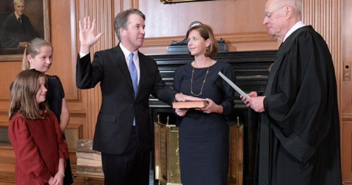Supreme Court Justice Brett Kavanaugh is sworn into office Saturday by retired Justice Anthony Kennedy.