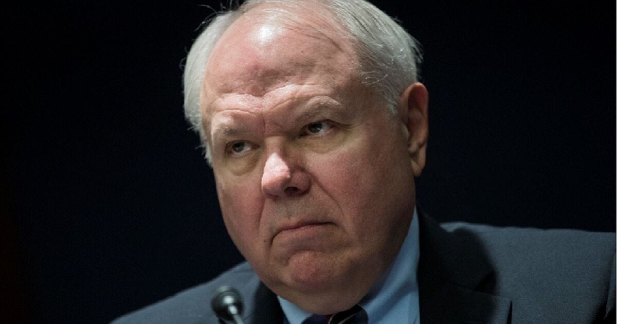 Bruce Bartlett, a former officials in the Reagan and George H.W. Bush administrations arrives in November 2017 at a Capitol Hill meeting with Democrats opposed to Republican plans to cut taxes.