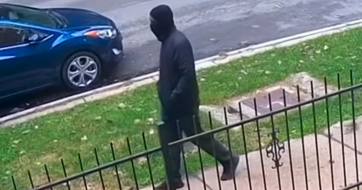 Chicago police have released images of a masked individual who is believed to have killed two people.