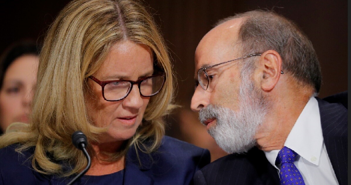 Christine Blasey Ford, left, the first accuser of Supreme Court nominee Brett Kavanaugh, consults with her attorney Michael Bromwich during last week's testimony before the Senate Judiciary Committee.