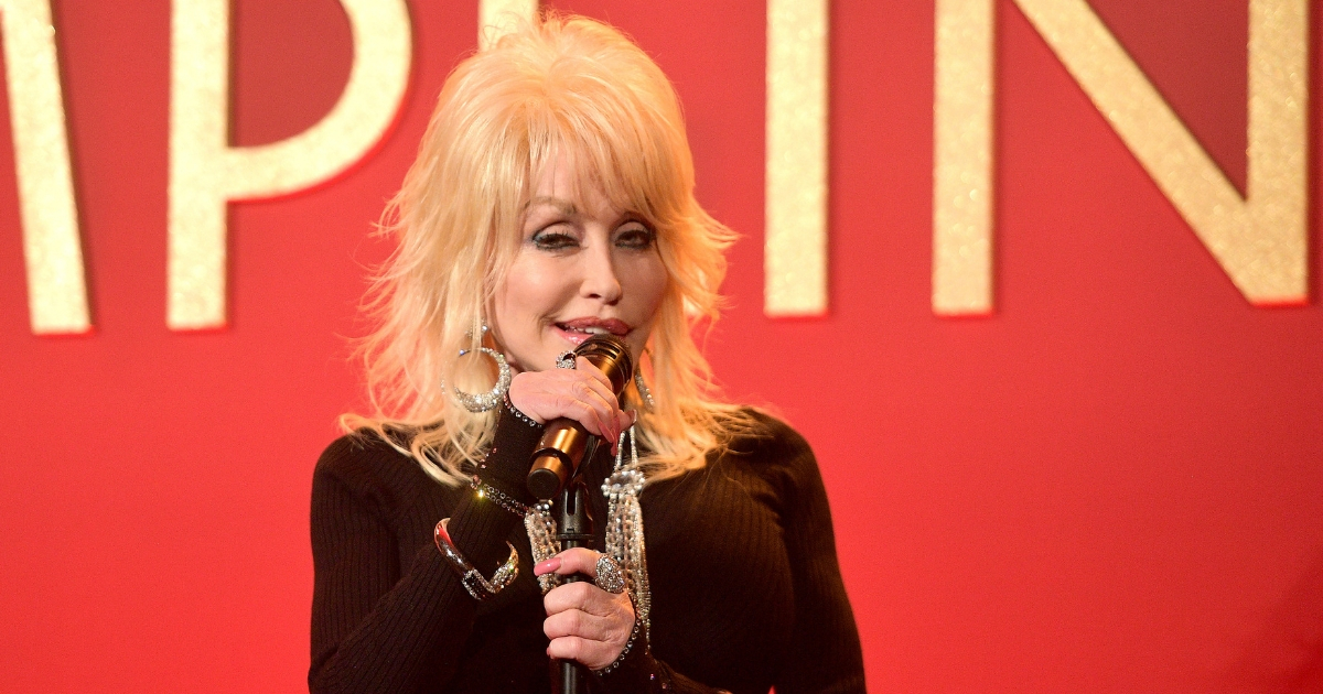Dolly Parton performs onstage at a luncheon for the Netflix Film Dumplin' at Four Seasons Hotel Los Angeles at Beverly Hills on Oct. 22, 2018, in Los Angeles, California.