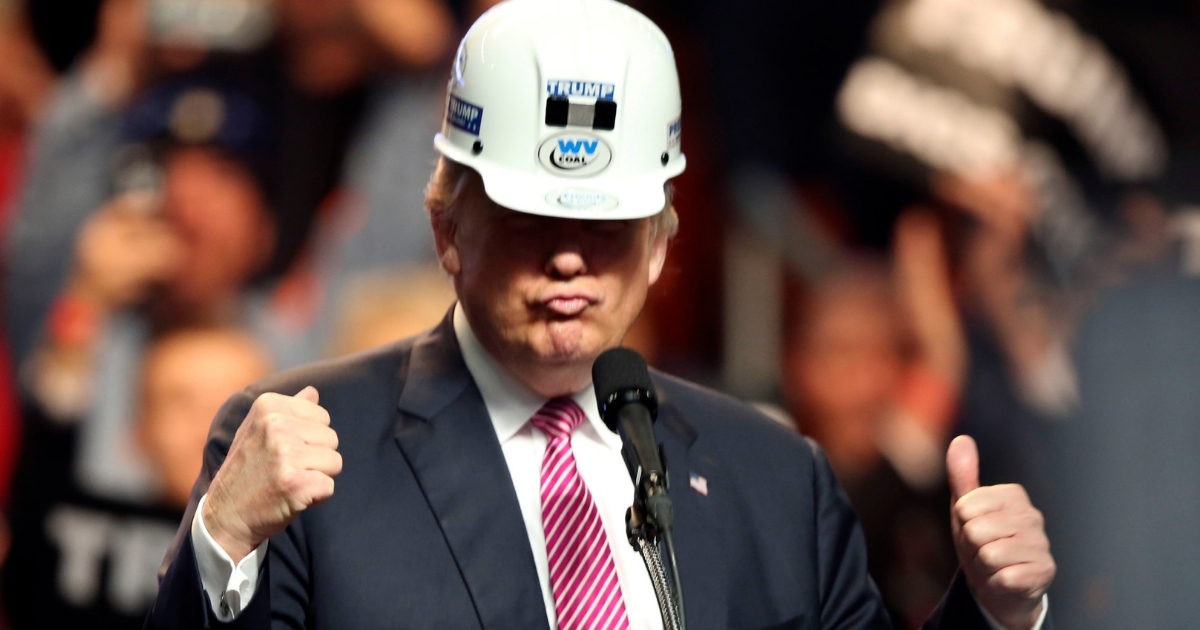 Then-presidential candidate Donald Trump put on a miners hard hat during a rally in Charleston, West Virginia in 2016.