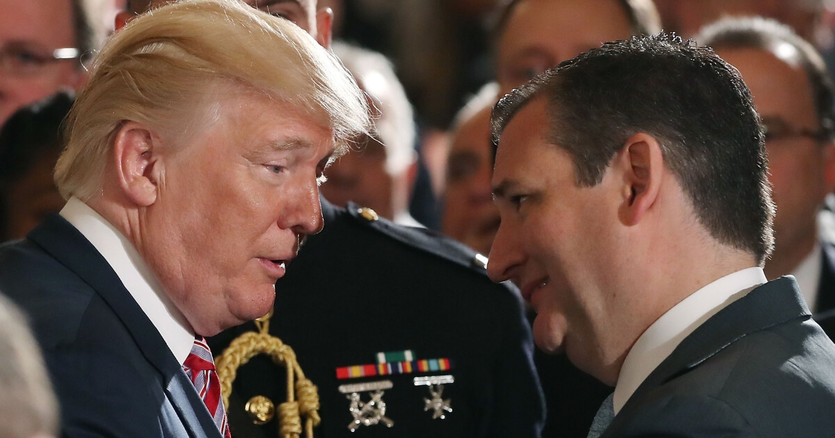 President Donald Trump shakes hands with Texas Sen. Ted Cruz at an event at the White House