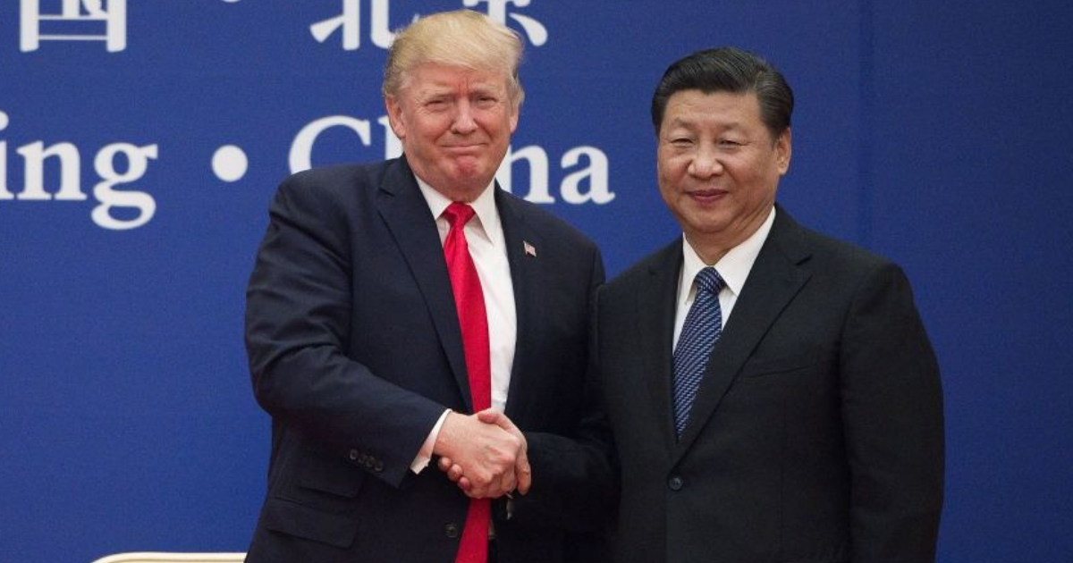 President Donald Trump and China's President Xi Jinping shake hands in Beijing in 2017.