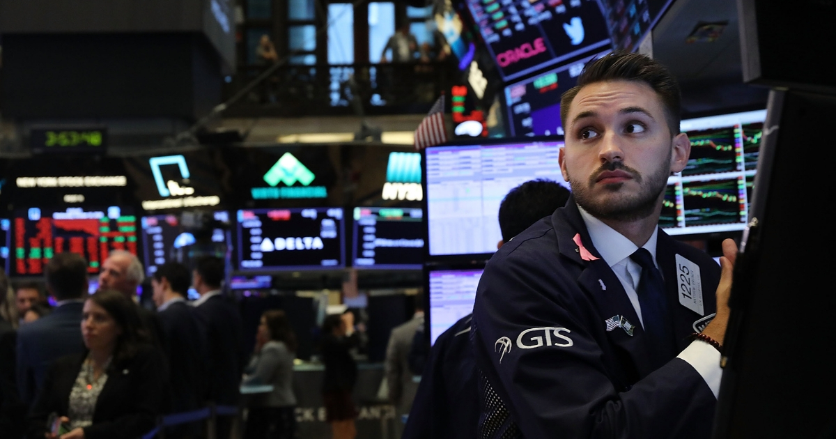Traders work on the floor of the New York Stock Exchange on Wednesday in New York City.