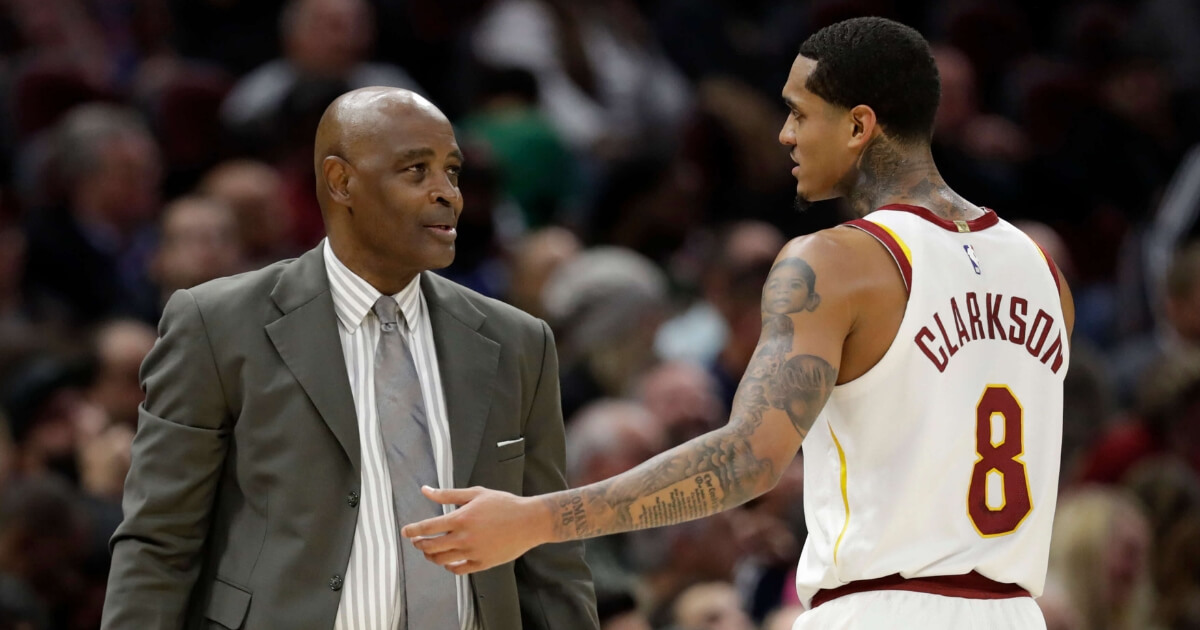 Cleveland Cavaliers acting head coach Larry Drew talks with Jordan Clarkson in the second half Tuesday against the Atlanta Hawks..