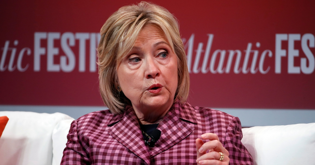 Former Secretary of State Hillary Clinton talks with Jeffrey Goldberg, editor-in-chief of The Atlantic, during The Atlantic Festival, Oct. 2, 2018, in Washington.