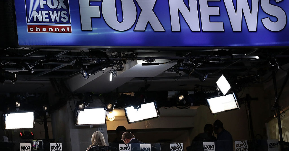 Fox News anchors work in the company's broadcast booth at the Democratic National Convention in Philadelphia.