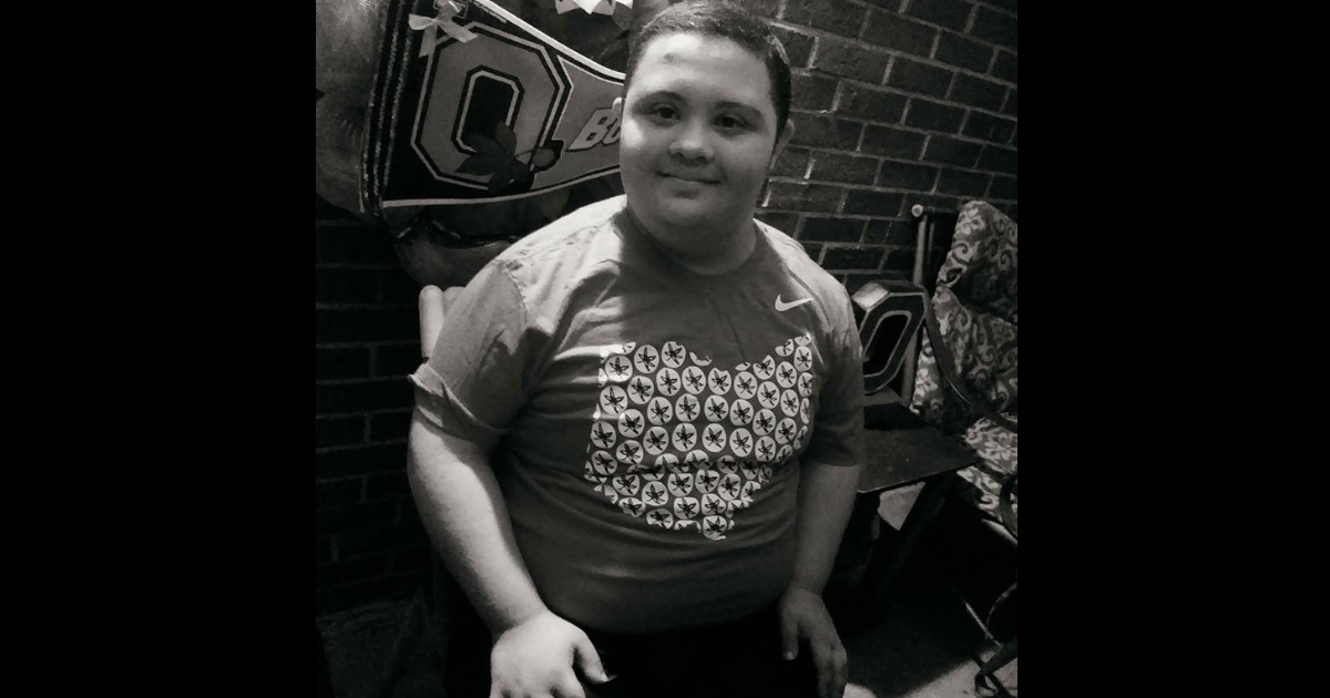 A teenage boy with Down syndrome.