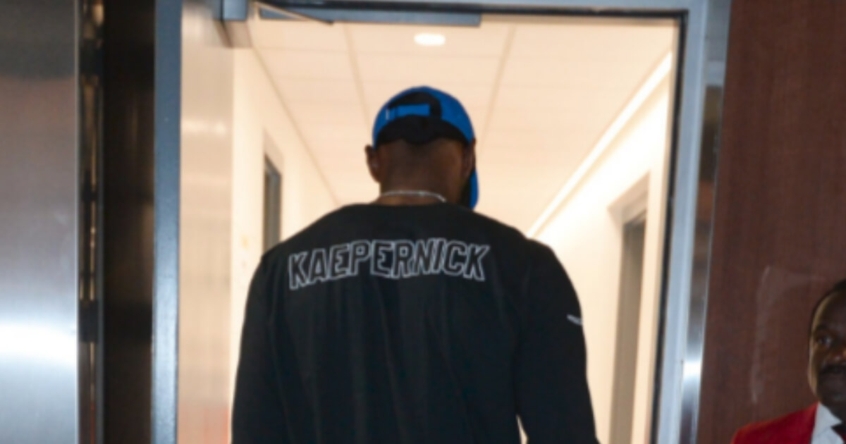 LeBron James wears a shirt supporting Colin Kapernick as he arrives at the Staples Center on Thursday.