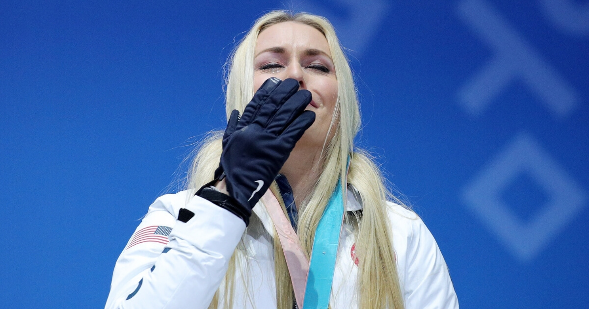 U.S. skier Lindsey Vonn gets emotional during the medal ceremony for the ladies' downhill at the PyeongChang 2018 Winter Olympic Games on Feb. 21.