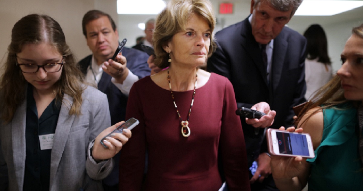 Alaska Sen. Lisa Murkowski makes her way to a weekly Republican luncheon last week at the Capitol.