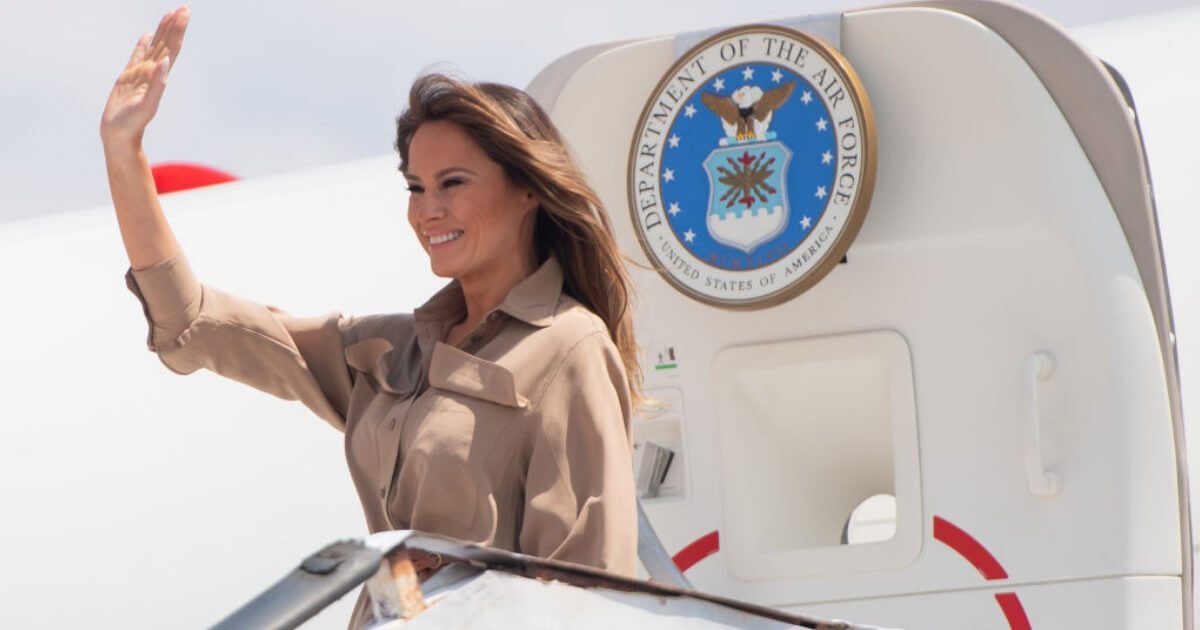 First lady Melania Trump waves upon her arrival Oct. 4 in Malawi.