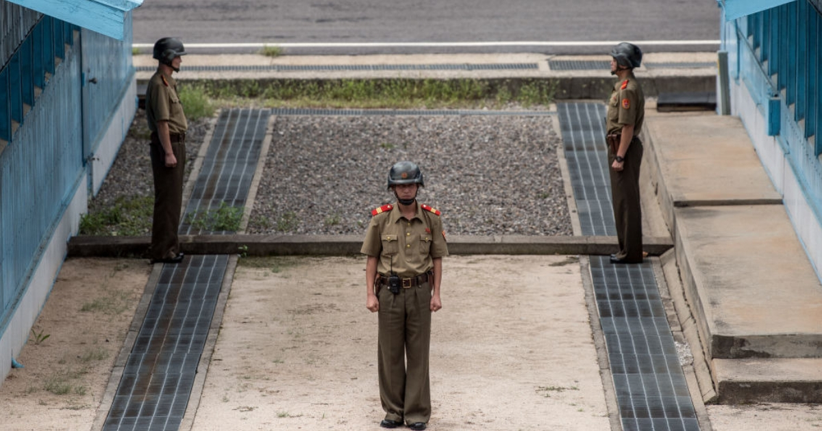 North Korean soldiers stand guard on the North Korean side of the Joint Security Area in the Demilitarized Zone.