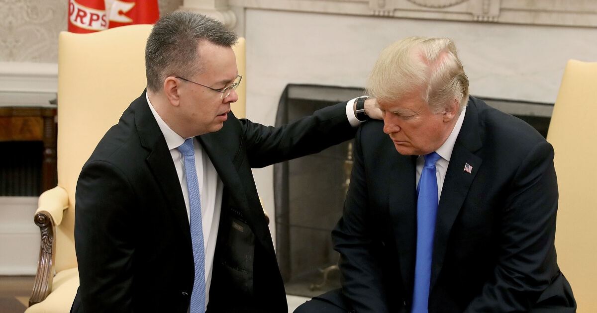 Pastor Andrew Brunson prays for President Trump